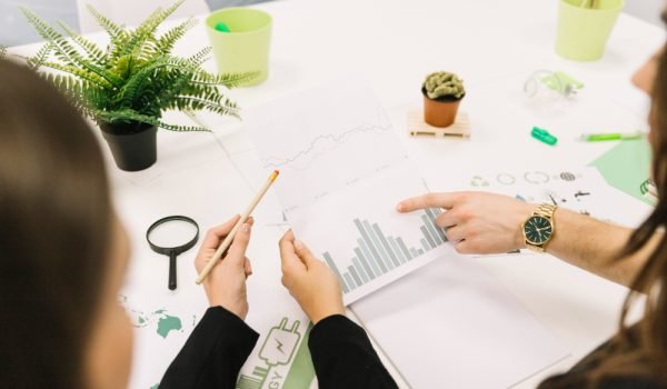 group-businesspeople-analyzing-graph-office group-businesspeople-analyzing-graph-office
